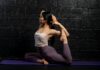 AI 건강 관리, 일상 속 똑똑한 선택이 시작된다 woman in white tank top and black leggings sitting on purple yoga mat