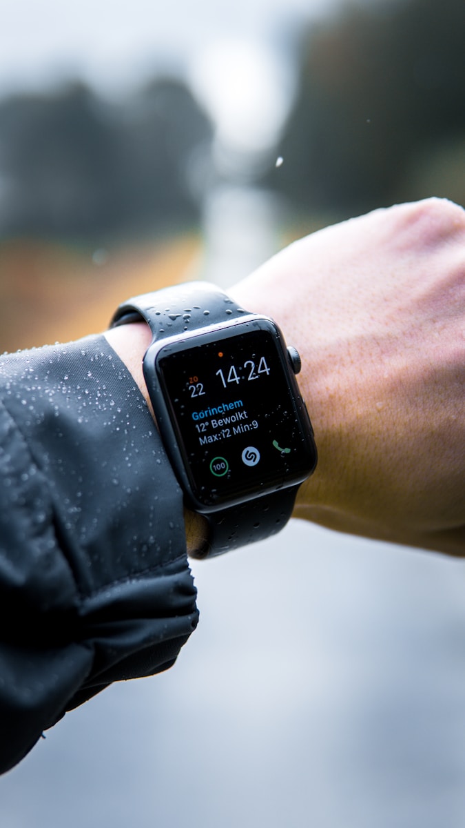 Photo by Lloyd Dirks person wearing Apple Watch at 14:24