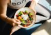 내 몸에 맞는 식단, 건강하게 시작해볼까요? a woman is holding a bowl of food